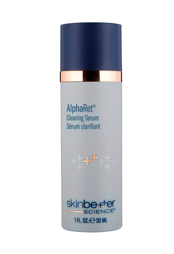 A 1 fl oz bottle of Skin Better AlphaRet Clearing Serum with a blue cap and gold band.